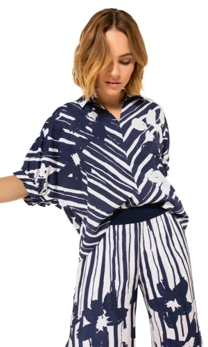 Blouse Col Polo Manches Courtes Dos Plus Long Imprimée